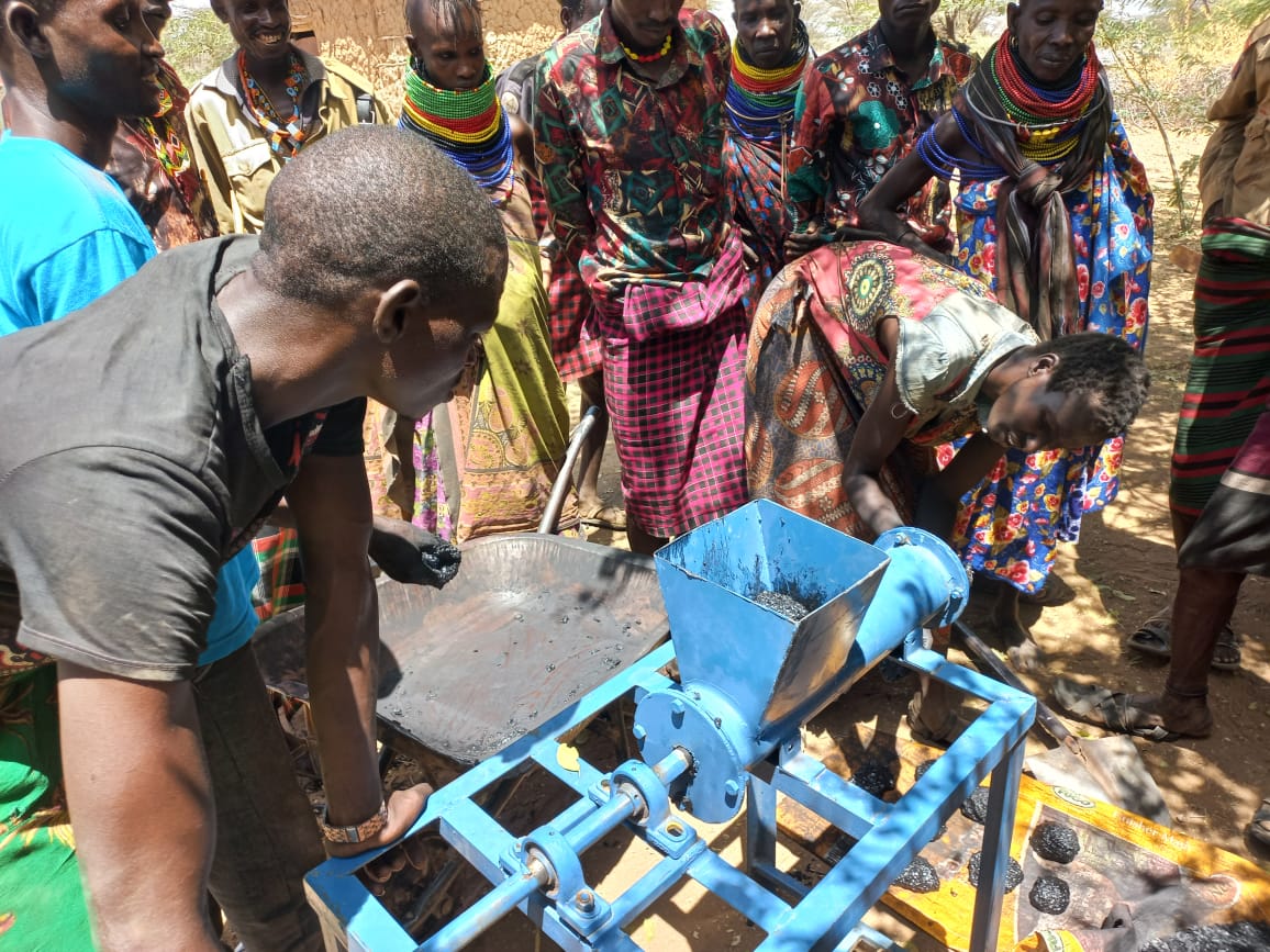 Briquetting machine in use